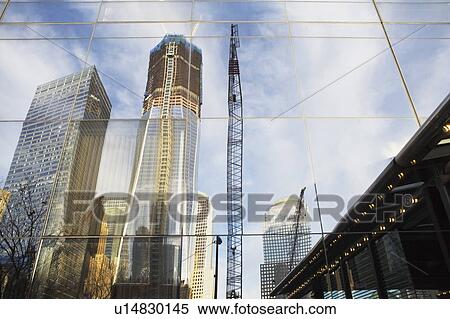 Usa, New York State, New York City, low angle view of reflection in skyscraper building View Large Photo Image Stock Photography - Usa, New York State, New York City, low angle view of reflection in skyscraper building. Fotosearch
