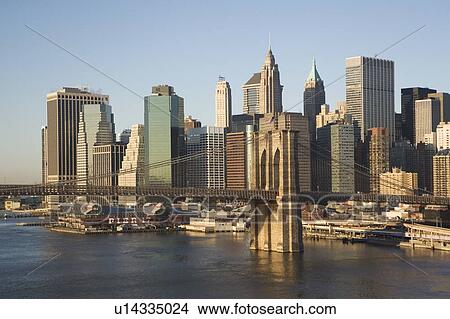 Picture - USA, New York State, New York City, Brooklyn Bridge with skyscrapers. Fotosearch