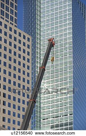 Usa, New York State, New York City, crane's hook in front of skyscraper View Large Photo Image Stock Image - Usa, New York State, New York City, crane's hook in front of skyscraper. Fotosearch