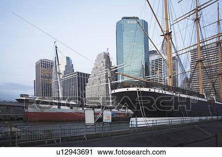 USA, New York State, New York City, seaport museum with skyscrapers in background View Large Photo Image Stock Image - USA, New York State, New York City, seaport museum with skyscrapers in background. Fotosearch