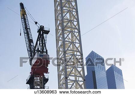 Usa, New York State, New York City, crane at construction site View Large Photo Image Stock Image - Usa, New York State, New York City, crane at construction site. Fotosearch