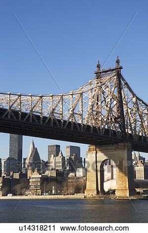 USA, New York State, New York City, bridge with Manhattan in background View Large Photo Image Stock Image - USA, New York State, New York City, bridge with Manhattan in background. Fotosearch