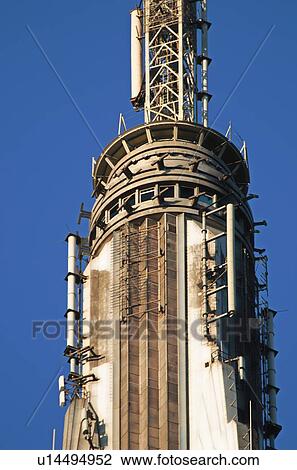 Stock Image - USA, New York State, New York City, Empire State building, Spire. Fotosearch