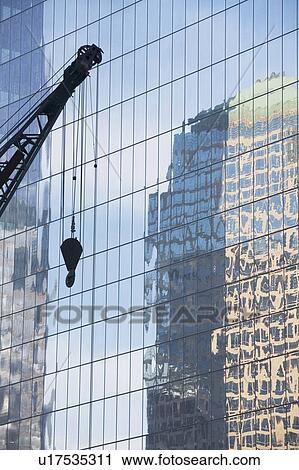 Usa, New York State, New York City, crane's hook and glass` reflection in skyscraper View Large Photo Image Stock Image - Usa, New York State, New York City, crane's hook and glass` reflection in skyscraper. Fotosearch