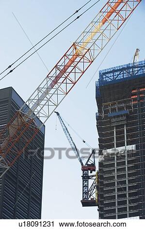 Stock Image - Usa, New York State, New York City, view of skyscraper construction. Fotosearch