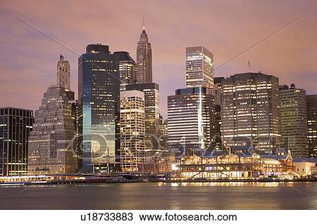 Stock Image - USA, New York State, New York City, cityscape in evening. Fotosearch