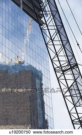 Usa, New York State, New York City, crane and glass` reflection in skyscraper View Large Photo Image Stock Image - Usa, New York State, New York City, crane and glass` reflection in skyscraper. Fotosearch