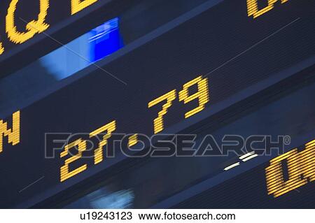Usa, New York State, New York City, Times Square, Stock Quotron, close-up of Ticker Tape Machine View Large Photo Image Stock Image - Usa, New York State, New York City, Times Square, Stock Quotron, close-up of Ticker Tape Machine. Fotosearch