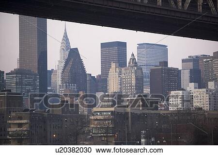Stock Image - USA, New York State, New York City, part of queensboro bridge with manhattan in distance. Fotosearch