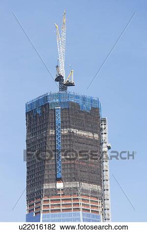 Usa, New York State, New York City, high section view of skyscraper construction View Large Photo Image Stock Image - Usa, New York State, New York City, high section view of skyscraper construction. Fotosearch