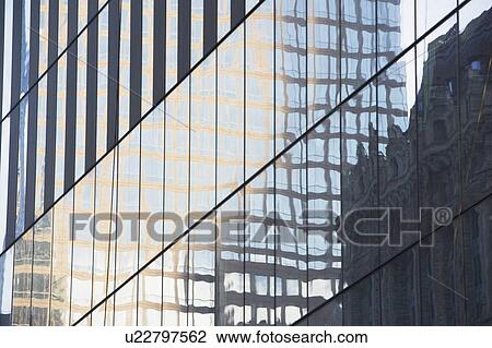Usa, New York State, New York City, close-up of glass reflection in skyscraper building View Large Photo Image Stock Image - Usa, New York State, New York City, close-up of glass reflection in skyscraper building. Fotosearch