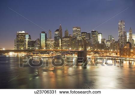 USA, New York state, New York city, Brooklyn Bridge with cityscape at night View Large Photo Image Stock Image - USA, New York state, New York city, Brooklyn Bridge with cityscape at night. Fotosearch