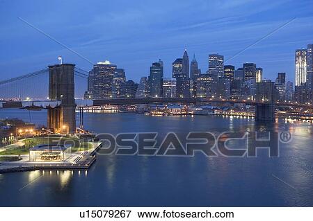 USA, New York state, New York city, Brooklyn Bridge with cityscape in evening View Large Photo Image Stock Photo - USA, New York state, New York city, Brooklyn Bridge with cityscape in evening. Fotosearch
