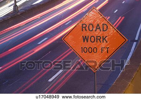 USA, New York state, New York city, road sign with vehicle lights View Large Photo Image Stock Photo - USA, New York state, New York city, road sign with vehicle lights. Fotosearch