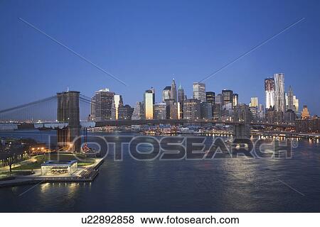 USA, New York state, New York city, Brooklyn Bridge with cityscape at night View Large Photo Image Stock Photo - USA, New York state, New York city, Brooklyn Bridge with cityscape at night. Fotosearch