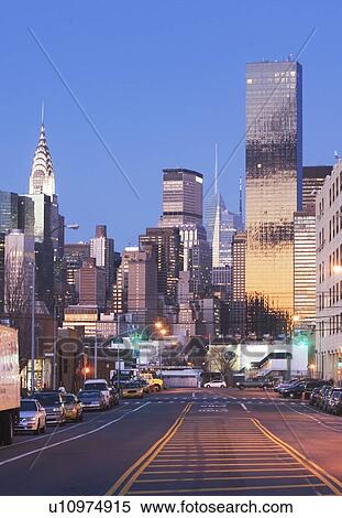 USA, New York State, New York City, city street with skyscrapers in background View Large Photo Image Stock Photography - USA, New York State, New York City, city street with skyscrapers in background. Fotosearch