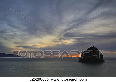 USA, Oregon, Lincoln County, Haystack Rock at dusk View Large Photo Image Stock Photography - USA, Oregon, Lincoln County, Haystack Rock at dusk. Fotosearch