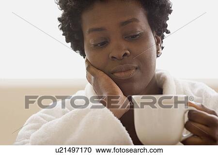Woman enjoying cup of tea View Large Photo Image Stock Image - Woman enjoying cup of tea. Fotosearch