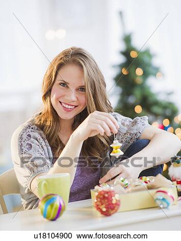Woman preparing christmas decoration View Large Photo Image Stock Image - Woman preparing christmas decoration . Fotosearch