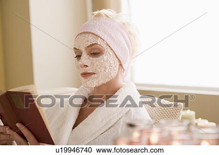 Woman reading book in spa View Large Photo Image Stock Image - Woman reading book in spa. Fotosearch