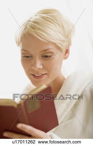 Woman reading book View Large Photo Image Stock Image - Woman reading book. Fotosearch