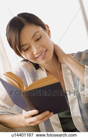 Stock Photo - Woman reading book. Fotosearch