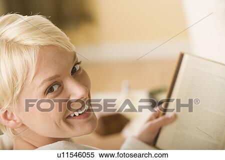 Woman reading book View Large Photo Image Stock Photography - Woman reading book. Fotosearch