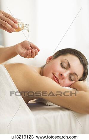 Woman receiving massage View Large Photo Image Stock Image - Woman receiving massage. Fotosearch