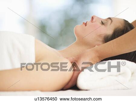 Woman receiving massage View Large Photo Image Stock Image - Woman receiving massage. Fotosearch