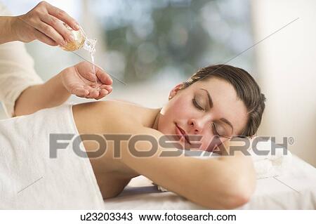 Woman receiving massage View Large Photo Image Stock Image - Woman receiving massage. Fotosearch