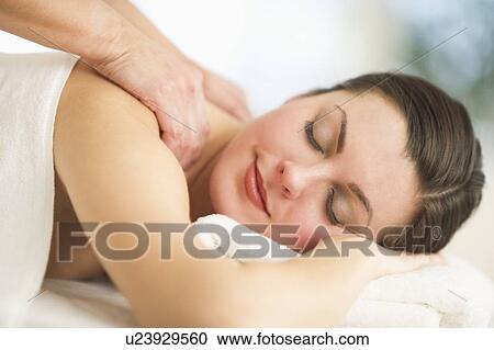 Woman receiving massage View Large Photo Image Stock Image - Woman receiving massage. Fotosearch