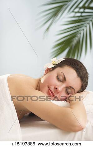 Stock Photograph - Woman relaxing in spa. Fotosearch