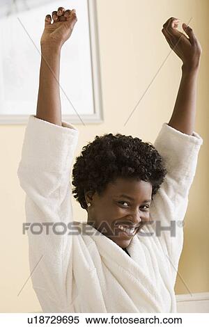 Woman stretching in morning View Large Photo Image Stock Photography - Woman stretching in morning. Fotosearch