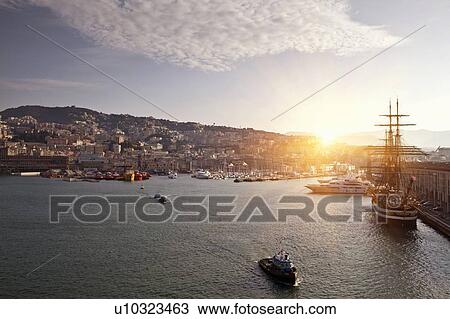 Stock Image - Aerial view of ships in urban bay. Fotosearch