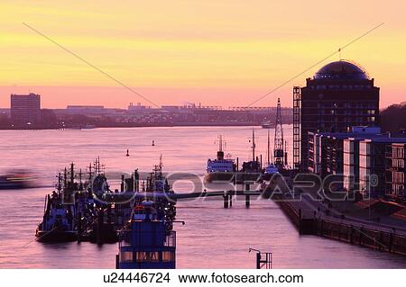 Aerial view of trawlers in urban pier View Large Photo Image Picture - Aerial view of trawlers in urban pier. Fotosearch