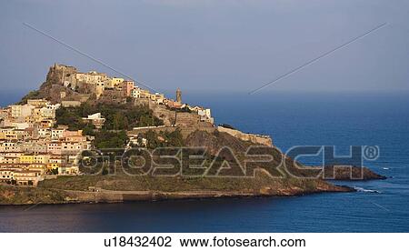 Aerial view of village on hillside View Large Photo Image Stock Image - Aerial view of village on hillside. Fotosearch