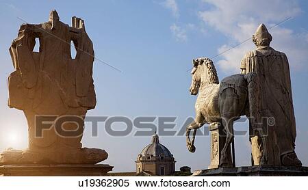 Ancient statues against blue sky View Large Photo Image Stock Photography - Ancient statues against blue sky. Fotosearch