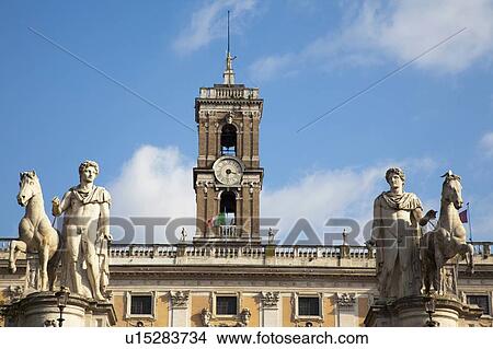 Ancient statues and clock tower View Large Photo Image Picture - Ancient statues and clock tower. Fotosearch
