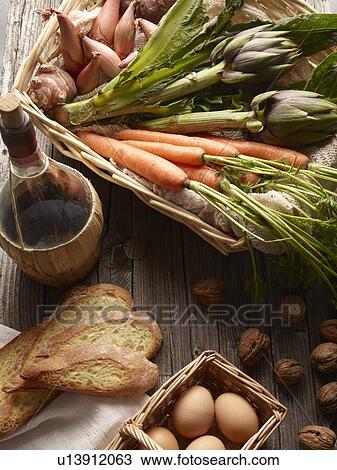 Basket of vegetables, eggs and bread View Large Photo Image Stock Image - Basket of vegetables, eggs and bread. Fotosearch