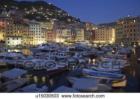 Boats docked in urban pier View Large Photo Image Stock Image - Boats docked in urban pier. Fotosearch