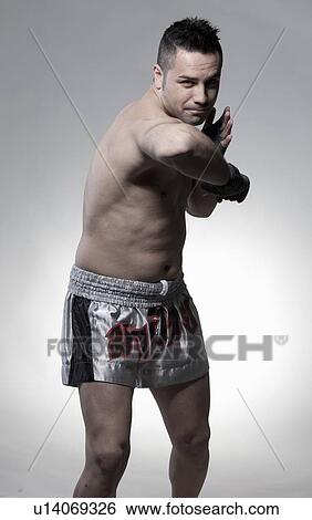 Stock Photograph - Boxer jabbing with elbow. Fotosearch