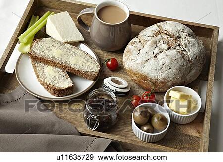 Stock Photo - Breakfast tray of bread, jam and coffee. Fotosearch