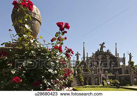 Bushes by ornate statues and columns View Large Photo Image Stock Image - Bushes by ornate statues and columns. Fotosearch