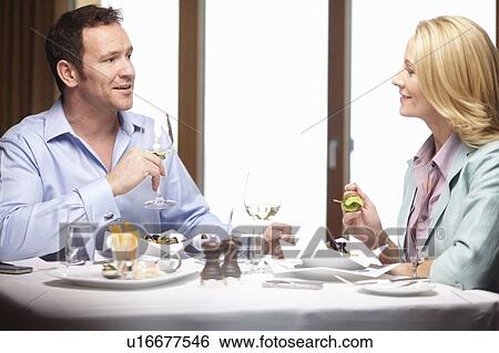 Business people talking in cafe View Large Photo Image Stock Photograph - Business people talking in cafe. Fotosearch