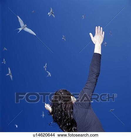 Picture - Businesswoman cheering outdoors. Fotosearch