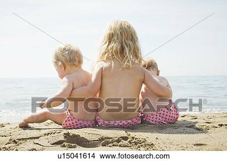 Picture - Children in matching bikini bottoms. Fotosearch