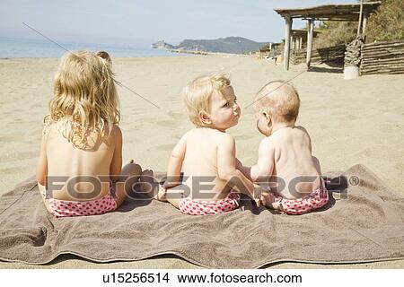 Children in matching bikini bottoms View Large Photo Image Picture - Children in matching bikini bottoms. Fotosearch