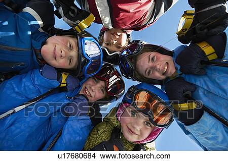 Picture - Children in ski gear standing together. Fotosearch