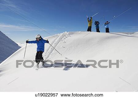 Children skiing on snowy mountainside View Large Photo Image Stock Photo - Children skiing on snowy mountainside. Fotosearch