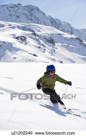 Children skiing on snowy mountainside View Large Photo Image Stock Photo - Children skiing on snowy mountainside. Fotosearch